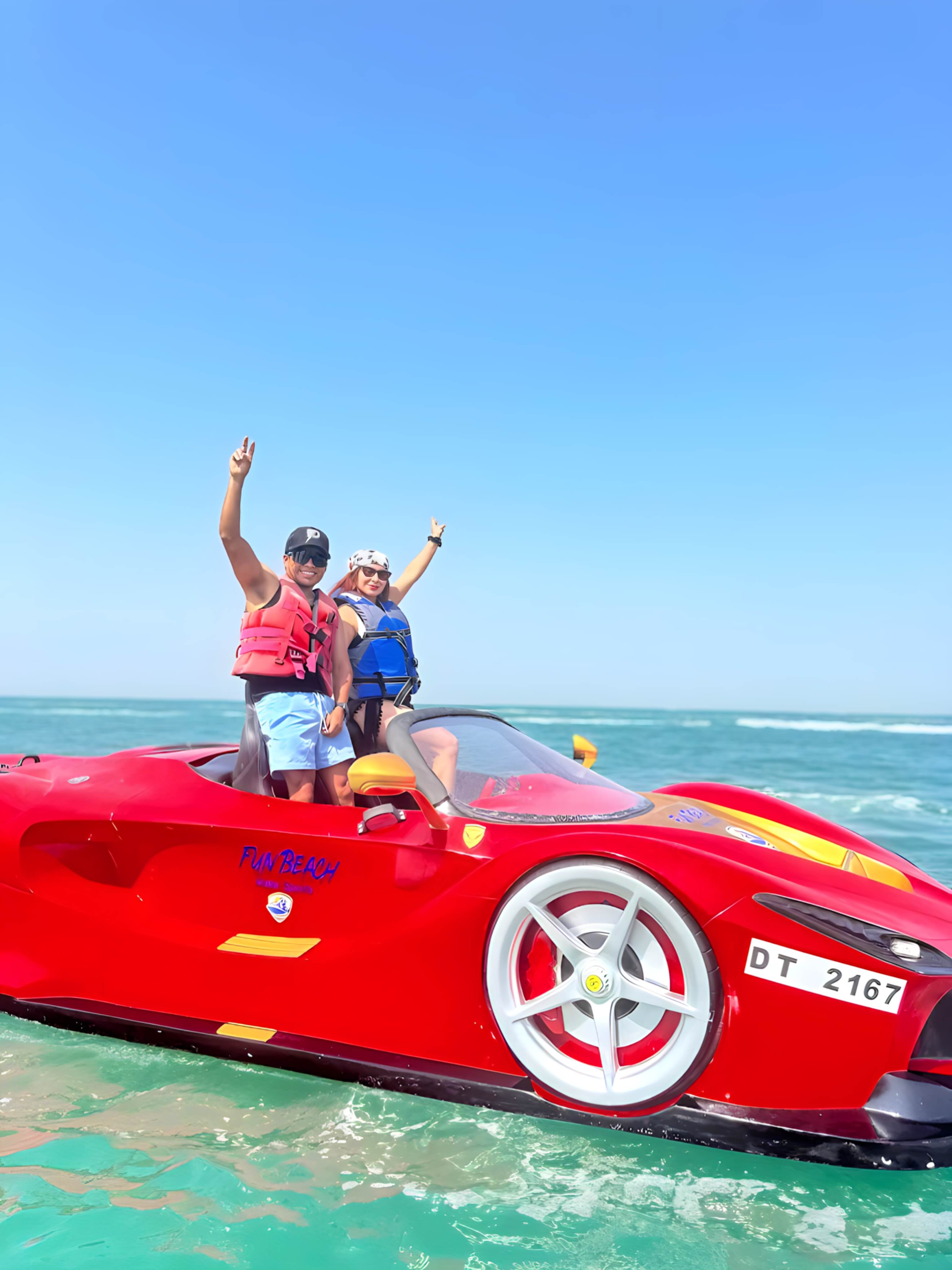Couple enjoying a jet car ride on the Arabian Gulf in Dubai