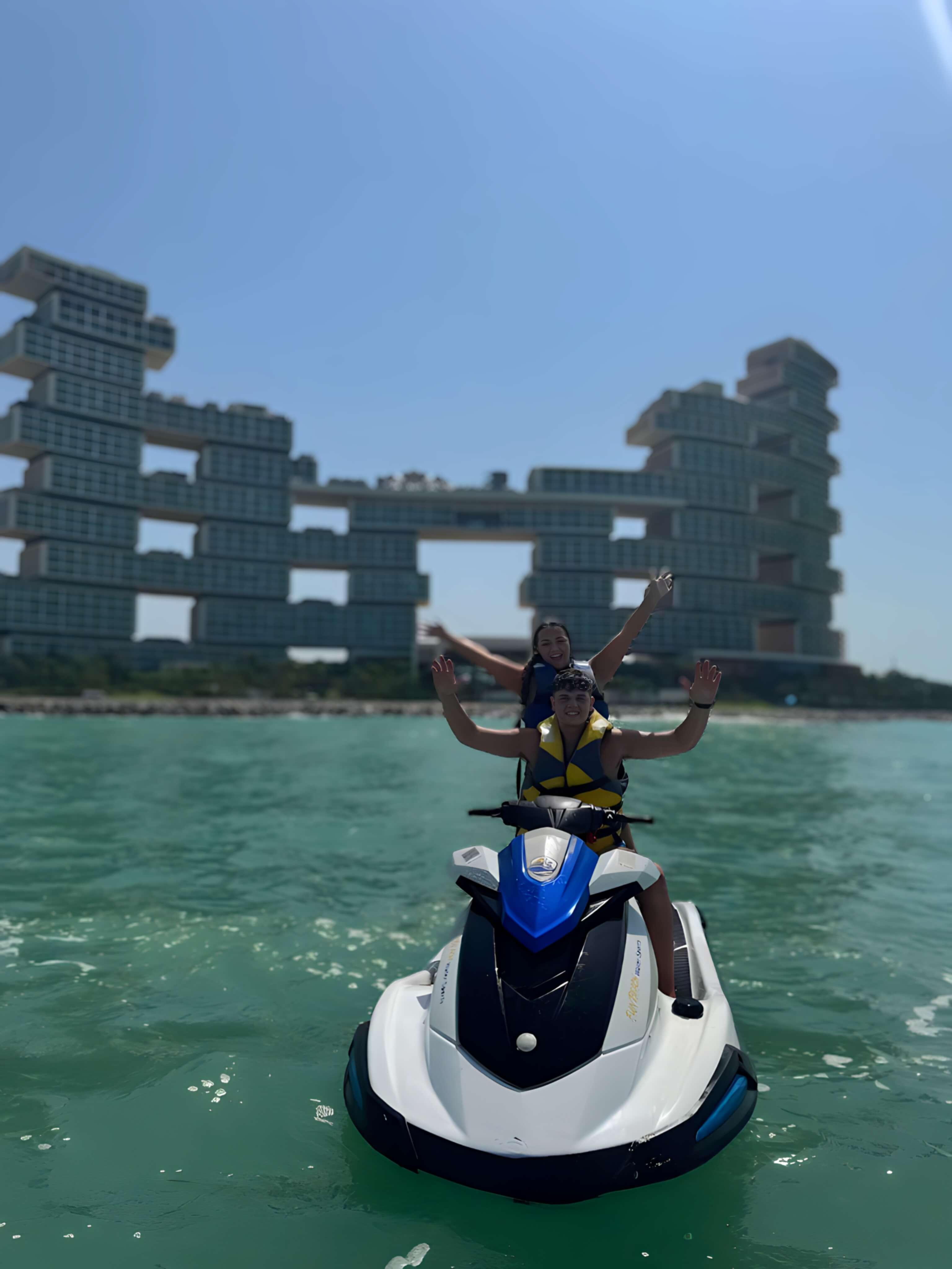 Jet ski rider near the Atlantis hotel on Palm Jumeirah in Dubai