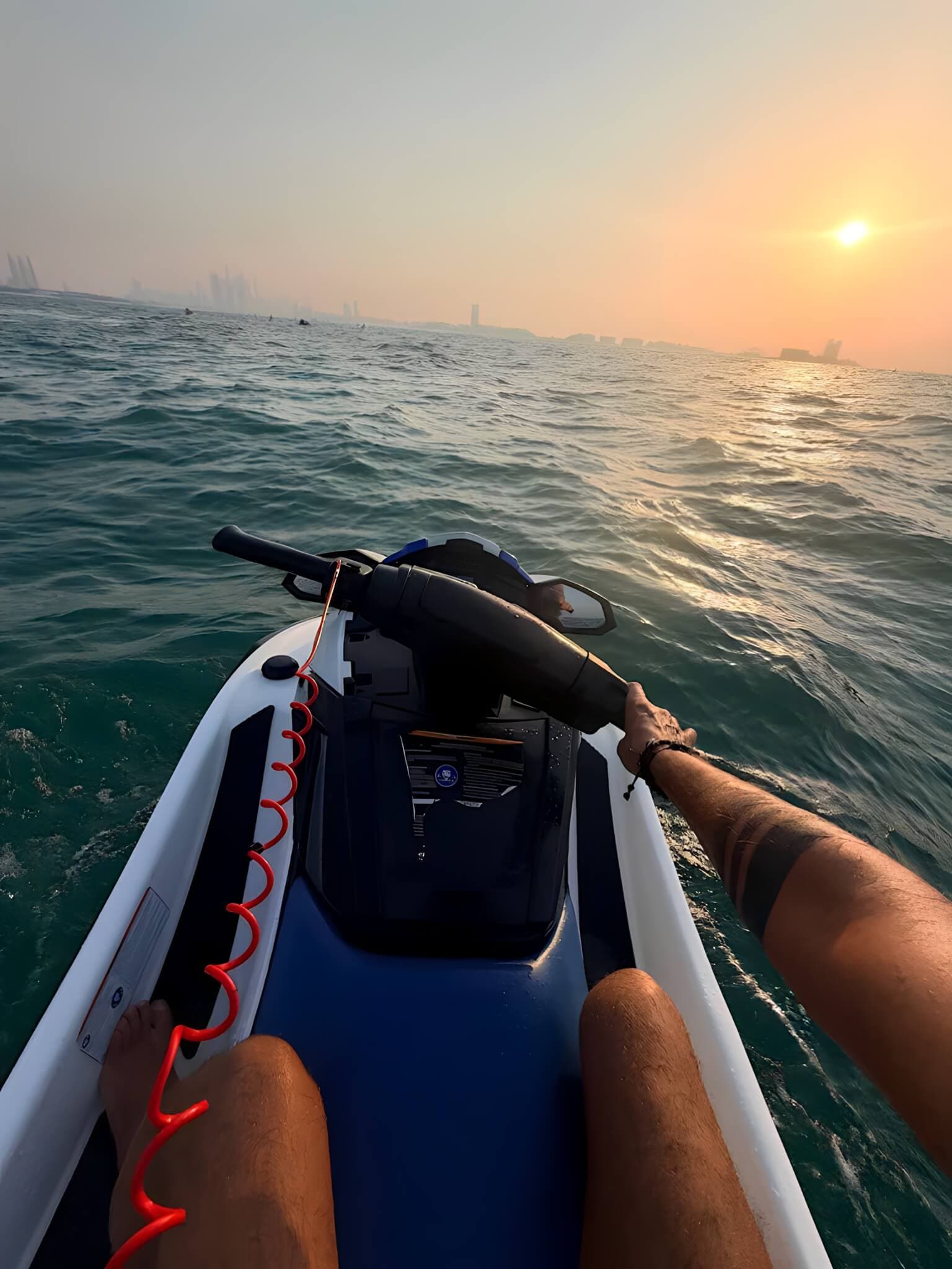 Point-of-view shot of a water sports ride at sunset in Dubai